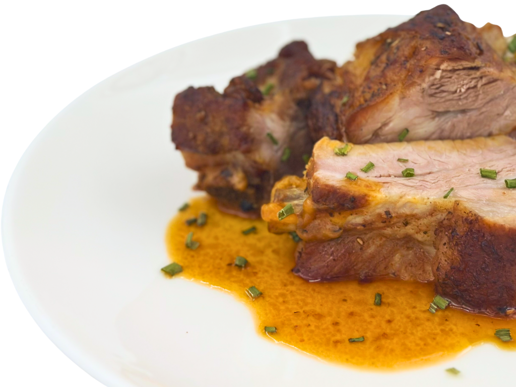 Costine di maiale al forno con crosta dorata